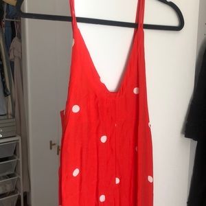 Polka dot red and white jumper.